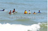 International trainers display surfing skills in Panambur Beach